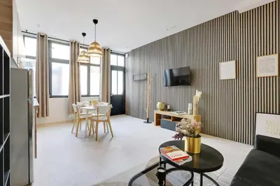 Télévision ou salle de divertissement dans l'établissement Modern flat - 1 bedroom 4 people - Montmartre