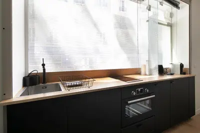 Cuisine ou kitchenette dans l'établissement Studio in Montmartre