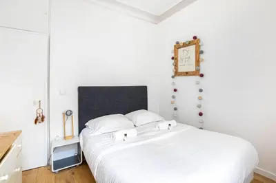 Un ou plusieurs lits dans un hébergement de l'établissement GuestReady - Charm & comfort in Charonne District