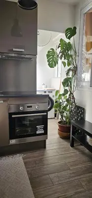 Cuisine ou kitchenette dans l'établissement Le calme ensoleillé