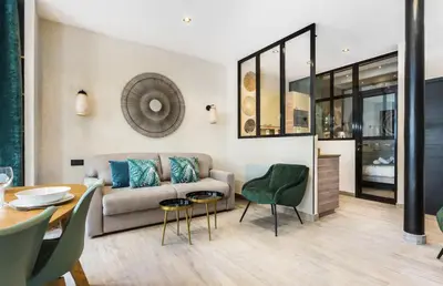 Coin salon dans l'établissement Appartement de Charme 2BR Alexandre Dumas