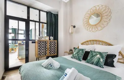 Un ou plusieurs lits dans un hébergement de l'établissement Appartement de Charme 2BR Alexandre Dumas