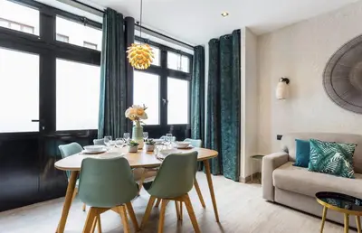 Coin salon dans l'établissement Appartement de Charme 2BR Alexandre Dumas