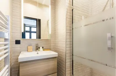 Salle de bains dans l'établissement Appartement de Charme 2BR Alexandre Dumas