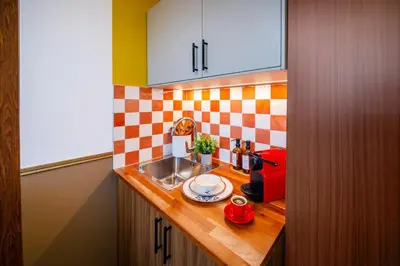 Cuisine ou kitchenette dans l'établissement ARK Hôtel Paris Boulogne