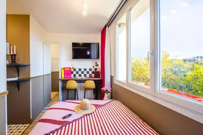 Un ou plusieurs lits dans un hébergement de l'établissement ARK Hôtel Paris Boulogne