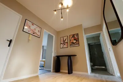 Télévision ou salle de divertissement dans l'établissement Charmant 2 chambres avec terrasse à Boulogne