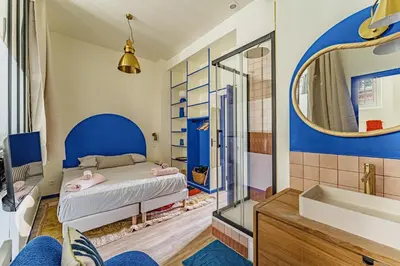 Un ou plusieurs lits dans un hébergement de l'établissement Cozy flat with Jacuzzi 2bdr 2WC