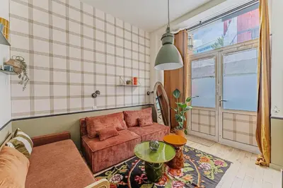 Coin salon dans l'établissement Cozy flat with Jacuzzi 2bdr 2WC