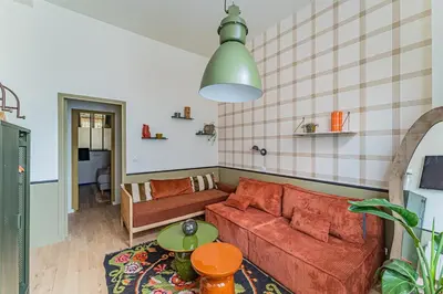 Coin salon dans l'établissement Cozy flat with Jacuzzi 2bdr 2WC