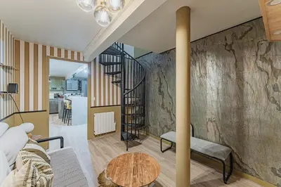 Coin salon dans l'établissement Cozy flat with Jacuzzi 2bdr 2WC