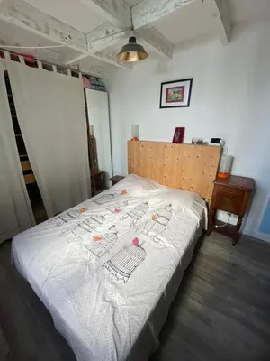 Un ou plusieurs lits dans un hébergement de l'établissement Maison de ville jardin derrière cité U à Gentilly