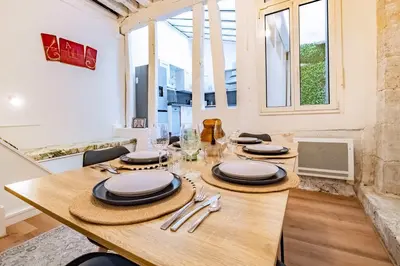 Coin salon dans l'établissement 6 Guests Flat in heart of Paris - Pompidou