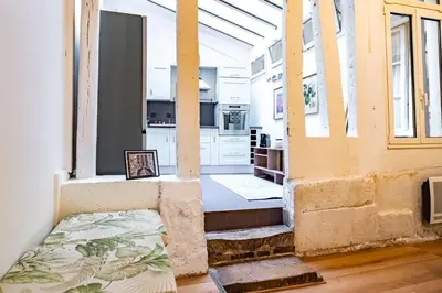 Coin salon dans l'établissement 6 Guests Flat in heart of Paris - Pompidou