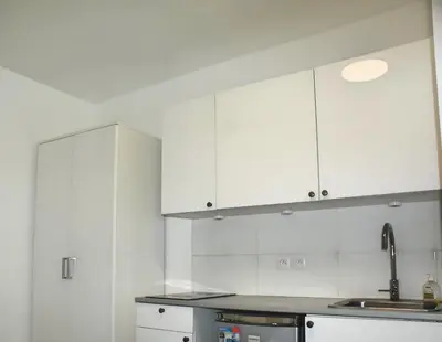 Cuisine ou kitchenette dans l'établissement Appartement au coeur de Paris - Proche du Metro