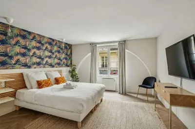 Un ou plusieurs lits dans un hébergement de l'établissement Luxury family Duplex 4 bdrs 10P - Republique