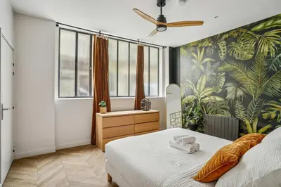 Un ou plusieurs lits dans un hébergement de l'établissement Luxury family Duplex 4 bdrs 10P - Republique