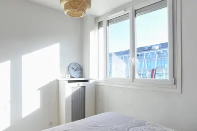 Un ou plusieurs lits dans un hébergement de l'établissement Bright apartment for 4 in Le Kremlin-Bicêtre