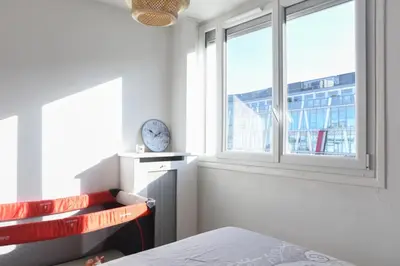 Un ou plusieurs lits dans un hébergement de l'établissement Bright apartment for 4 in Le Kremlin-Bicêtre