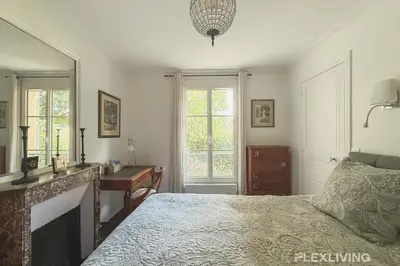 Un ou plusieurs lits dans un hébergement de l'établissement Charming - One-Bedroom Apartment in Paris 5th