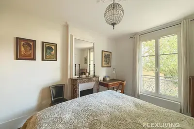 Un ou plusieurs lits dans un hébergement de l'établissement Charming - One-Bedroom Apartment in Paris 5th