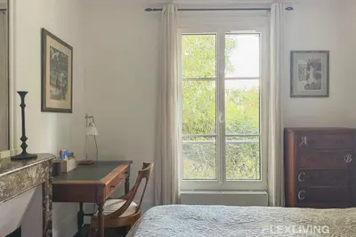 Un ou plusieurs lits dans un hébergement de l'établissement Charming - One-Bedroom Apartment in Paris 5th