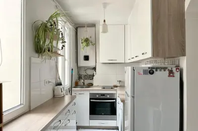 Cuisine ou kitchenette dans l'établissement Lovely One-Bedroom Apartment in Paris 18th
