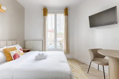 Un ou plusieurs lits dans un hébergement de l'établissement Mykeypers- Luxury Studio 2P - Malakoff 14
