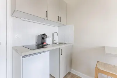 Cuisine ou kitchenette dans l'établissement Mykeypers- Premium Studio 2P - Malakoff 35