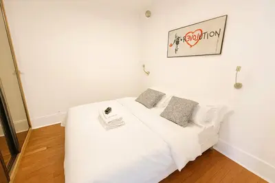 Un ou plusieurs lits dans un hébergement de l'établissement Appartement familial centre nation - 6 personnes