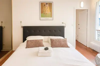 Un ou plusieurs lits dans un hébergement de l'établissement Appartement familial centre nation - 6 personnes