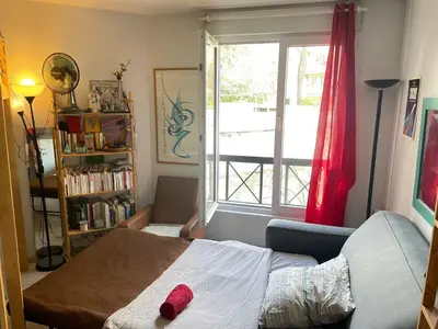 Un ou plusieurs lits dans un hébergement de l'établissement Appartement 26m2 Parisien Canal St Martin
