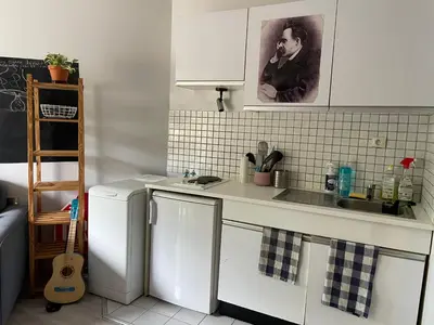 Cuisine ou kitchenette dans l'établissement Appartement 26m2 Parisien Canal St Martin