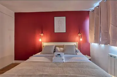 Un ou plusieurs lits dans un hébergement de l'établissement Saint-Augustin - Appartement Opéra 6P