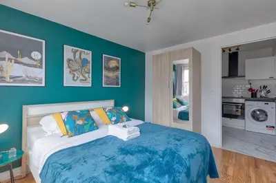 Un ou plusieurs lits dans un hébergement de l'établissement Saint-Augustin - Appartement Opéra 6P