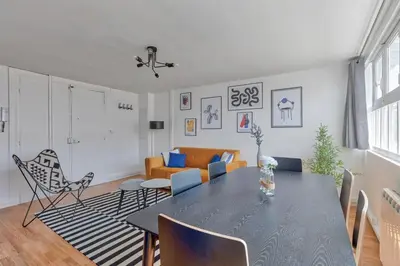 Coin salon dans l'établissement Saint-Augustin - Appartement Opéra 6P