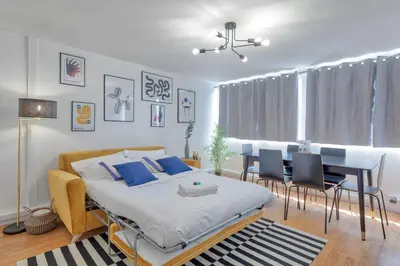 Un ou plusieurs lits dans un hébergement de l'établissement Saint-Augustin - Appartement Opéra 6P