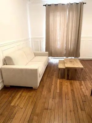 Coin salon dans l'établissement Appartement Idéal près des Quais de Seine-métro 7-6-5