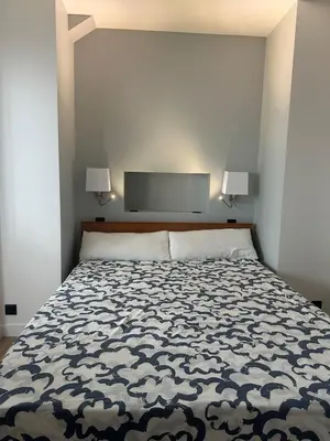 Un ou plusieurs lits dans un hébergement de l'établissement New apartment