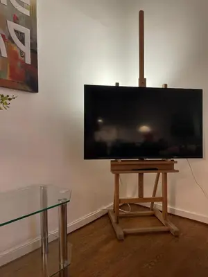 Télévision ou salle de divertissement dans l'établissement Delightful Dauphine Apartment Saint-Germain