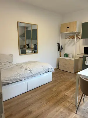 Cuisine ou kitchenette dans l'établissement L'à Côté du Jardin