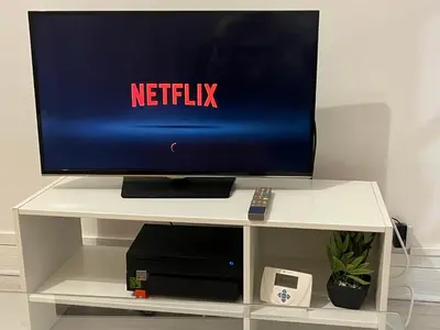 Télévision ou salle de divertissement dans l'établissement Appartement calme au cœur du 20 eme arrondissement