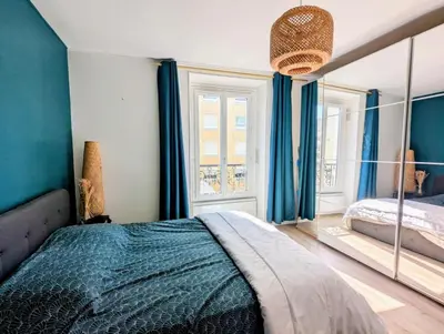 Un ou plusieurs lits dans un hébergement de l'établissement Cosy et confortable appartement 4 personnes