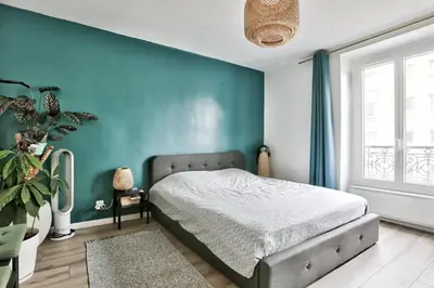 Un ou plusieurs lits dans un hébergement de l'établissement Cosy et confortable appartement 4 personnes