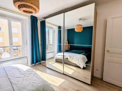 Un ou plusieurs lits dans un hébergement de l'établissement Cosy et confortable appartement 4 personnes