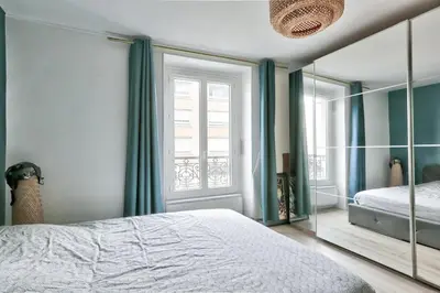 Un ou plusieurs lits dans un hébergement de l'établissement Cosy et confortable appartement 4 personnes