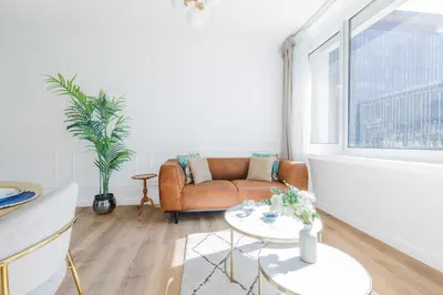 Coin salon dans l'établissement Charming apartment 2 BDR-3P - Gare Montparnasse-