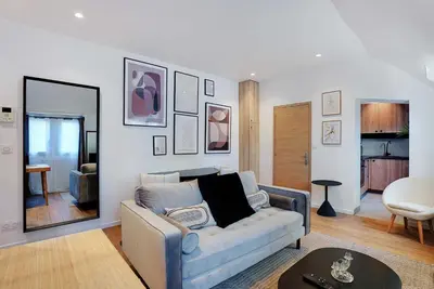 Coin salon dans l'établissement Apartment Cosy - 1BDR-2P - Concorde