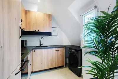 Cuisine ou kitchenette dans l'établissement Apartment Cosy - 1BDR-2P - Concorde