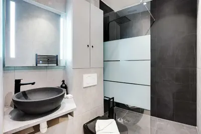 Salle de bains dans l'établissement Apartment Cosy - 1BDR-2P - Concorde
